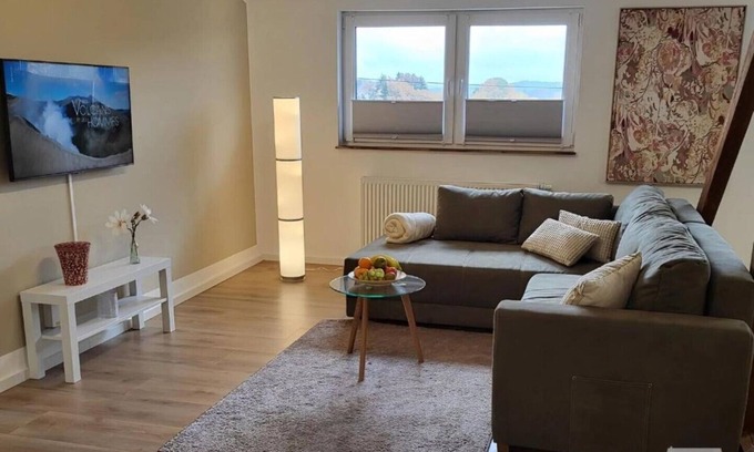 Losheim am See Apartment | Gästehaus am Bachlauf: Cozy 68m² Getaway with Views