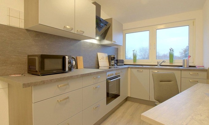 Midlum Apartment | Family-Friendly Retreat at Gästehaus Midlum with Kitchen