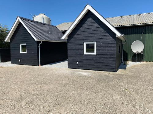 Tonder Bed & Breakfast | Cozy Hytter udlejes: Ideal for Families with Kitchen Access