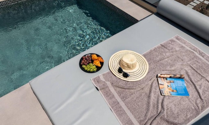 Kamari Apartment | G & W Suites: 4-Star Oceanfront Retreat with Hot Tub