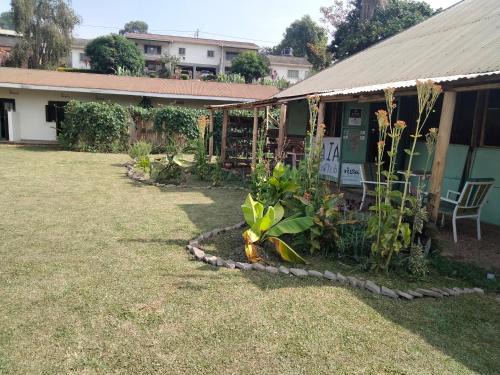 Fort Portal Bed & Breakfast | Eco-Friendly Retreat: Gaia Eco Hub BnB with Family Amenities