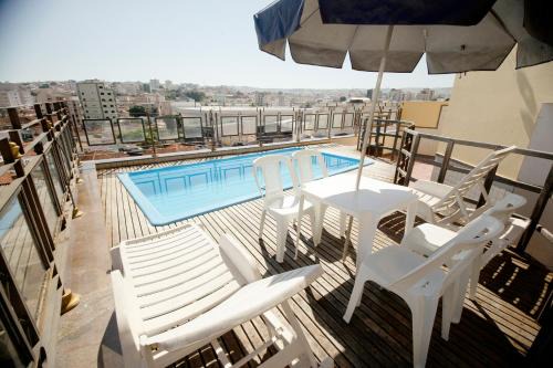 Patos de Minas Hotel | Discover Galatas Central Hotel with Pool & Family Amenities