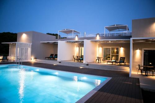 Skafidia Apartment | Elegant Galinio Boutique Apartments with Pool & Family Amenities