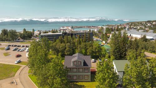 Husavik Apartment | Discover Gamli Skólinn Húsavík: 4-Star Family Retreat