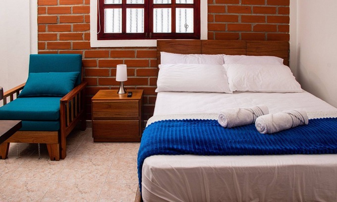 Retiro Apartment | Discover Garcha: Family-Friendly Hotel with Spa and Dining