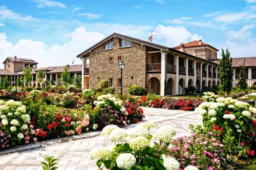 Pozzolengo Apartment | Relax at Garda Residence San Vigilio with Pool & Spa Access