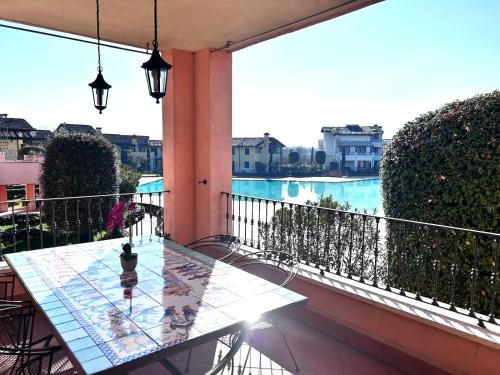 San Benedetto di Lugana Apartment | Serene Oceanfront Apartment with Pool and Great Reviews