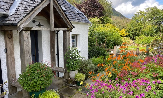 West Laroch Cottage | Cozy Garden Cottage with Ocean Views and Pet-Friendly Perks