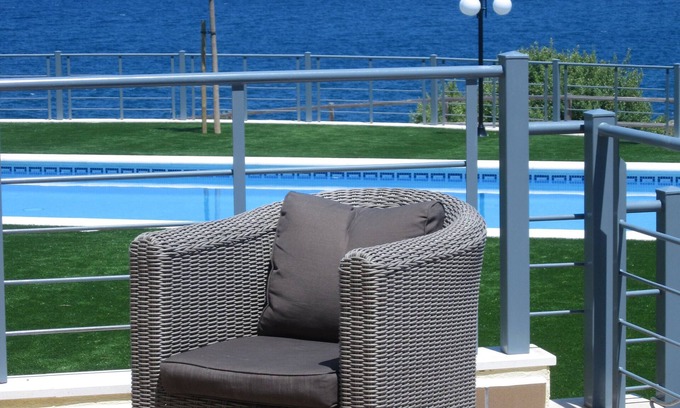 Llanca Apartment | Oceanfront Apartment with Pool & Spectacular Sea Views