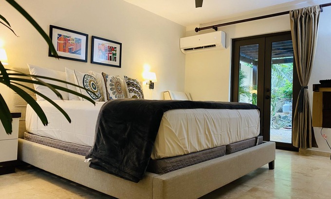 Naguabo House | Elegant Garden Suite Steps from Beach and Dining Options