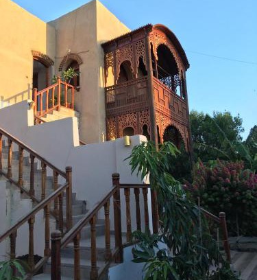 Luxor Apartment | Idyllic Garden View Guest House with Oceanfront Dining