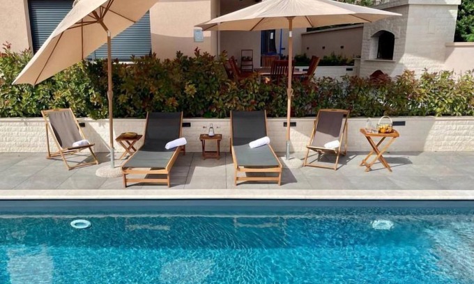 Sveti Filip i Jakov Apartment | Relaxing Garden Villa with Ocean Views and Pool Access