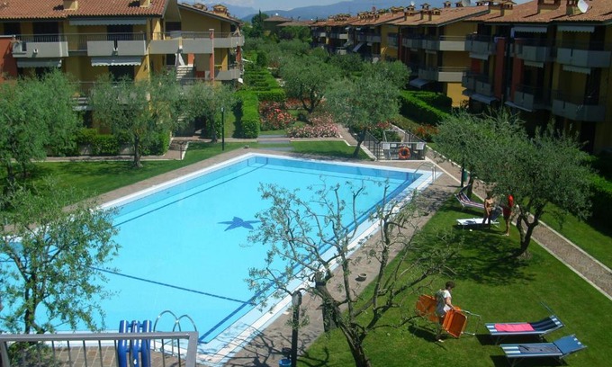 Lugana Apartment | Gardenia Holiday Home: Guest Rated 10/10 with Ocean Views
