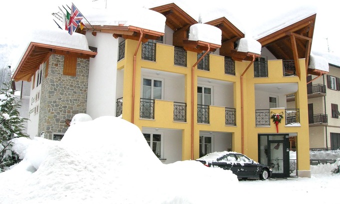Dimaro Hotel | Discover Garni Sottobosco: Cozy Stay with Family-Friendly Perks