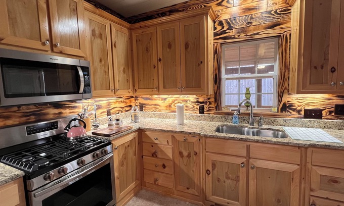 Onalaska Cabin | Gary's Getaway-2/1.5 cabin with covered boat parking and private boat ramp.