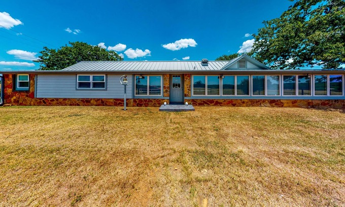 Mineral Wells House | Gated Home next to Lake with Gorgeous Sunroom, Game Room & Fireplace