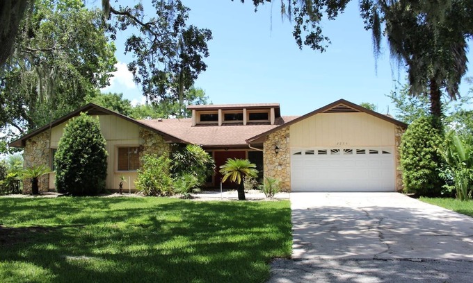 Oviedo House | Lakefront 3-Bed Ranch with Hot Tub & Exceptional Reviews