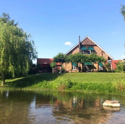 Warendorf Villa | Cozy Lakefront House with Fireplace and Ocean Views