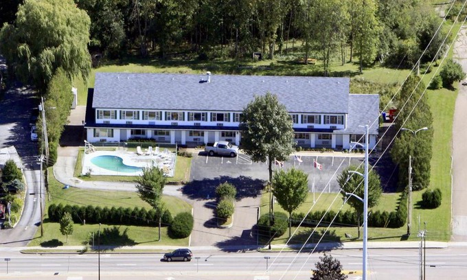 South Burlington Hotel | Budget-Friendly Stay at GGT Tibet Inn with Cozy Comfort