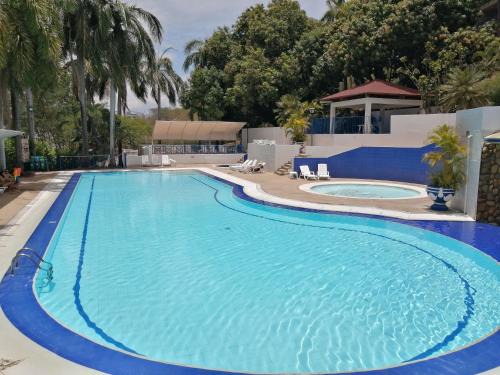 Ricaurte Apartment | Discover Girardot Resort: Pet-Friendly Paradise by the Sea