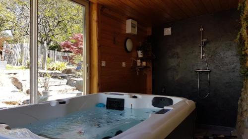 Saint-Grave House | Family-Friendly Gite de la Noellerie with Relaxing Hot Tub