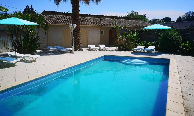 Maraussan House | Relax at Gîte T3 Le Cycas with Pool in Scenic Grounds