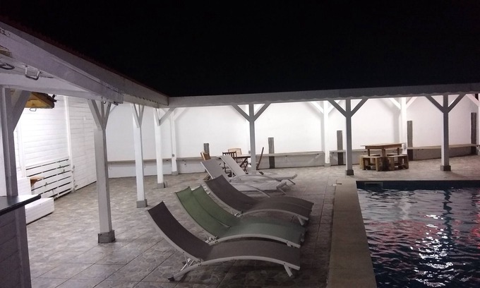 Ste-Genevieve Apartment | Experience Gites Chadèk: Pet-Friendly Retreat with Ocean Views