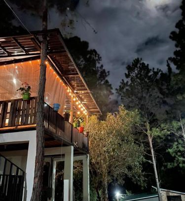 Valle de Angeles Ski Chalet | Eco-Friendly Glamping Anturios with Ocean View Amenities