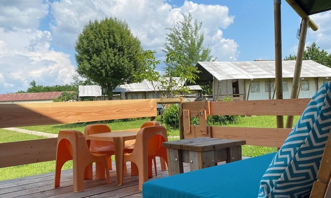 Jayac RV Rental | Glamping 'Safarilodge Confort Tent 8 5 Pers' with Shared Pool, Private Terrace and Wi-Fi