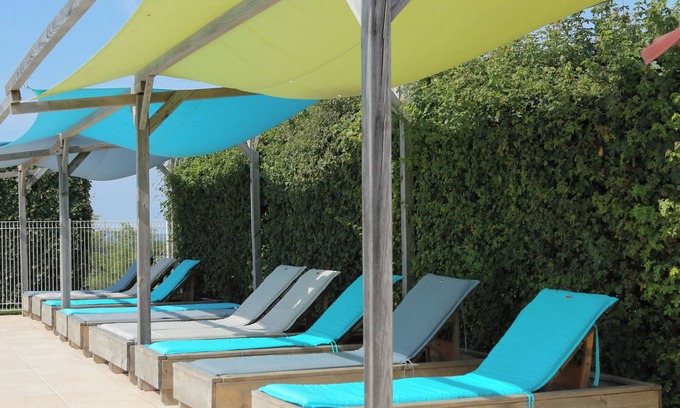 Jayac RV Rental | Glamping 'Safarilodge Prestige Tent 10 5pers' with Shared Pool, Wi-Fi and Air Conditioning