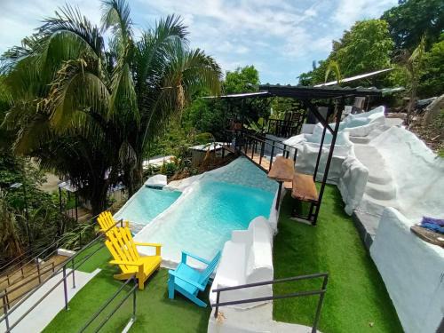 Manuel Antonio Cabin | Discover Glamping Tomaselli: Pool, Kitchen & Family Fun