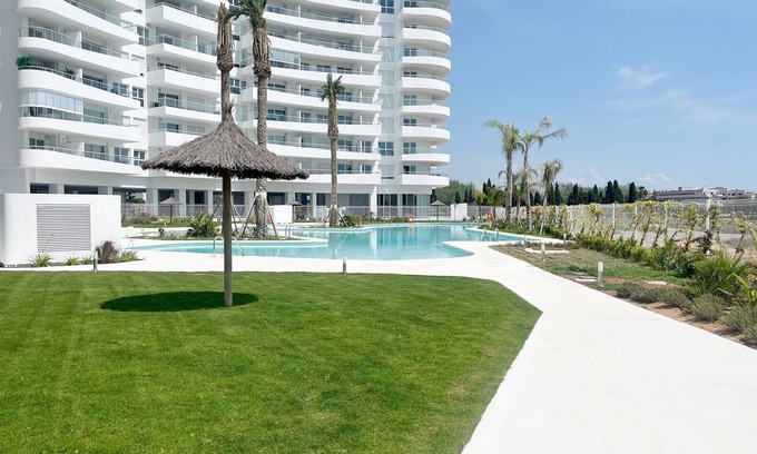 Canet de Berenguer Apartment | Inviting Global Properties: Apartment with Terrace & Pool Views