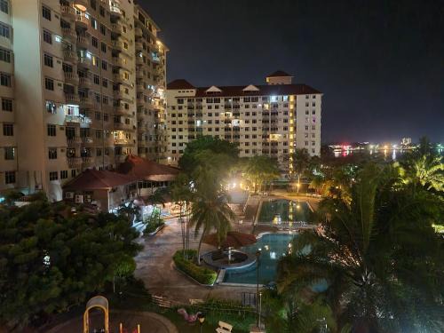 Taman Tanjung Apartment | Seaview Bliss at Glory Beach Resort with Private Beach Access