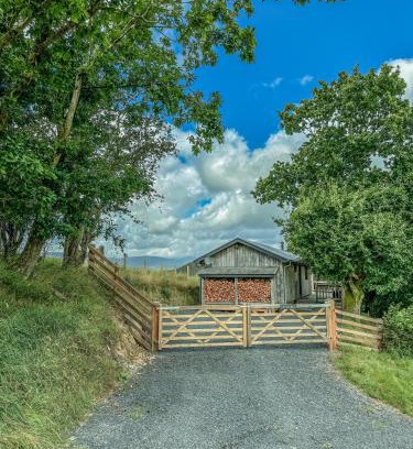 Machynlleth House | Kid-Friendly Glyndwr Way Cabin with Great Guest Reviews