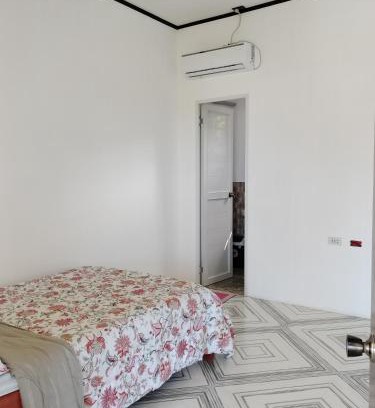 Daanbantayan House | Cozy GmL Lodge House: Family & Pet Friendly Retreat