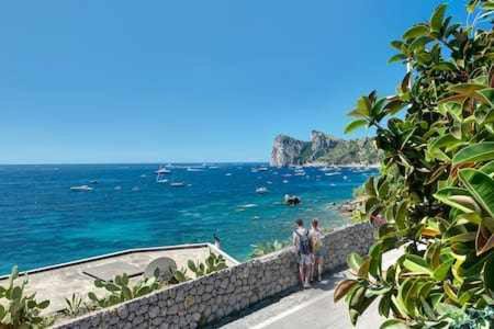 Marina del Cantone Apartment | Ginestra Beach Suite: Family-Friendly & Pet Welcome Retreat