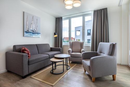 Alt-Travemunde/Ronnau Apartment | Discover Godewindpark Travemünde: Family & Pet-Friendly Retreat
