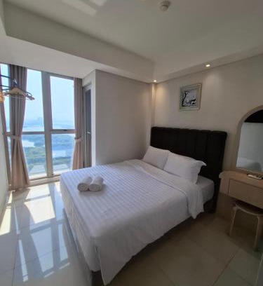 Pantai Indah Kapuk Apartment | Cozy Gold Coast Apartment with Oceanfront Pool Access