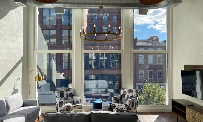 West Main Historic District Apartment | Gold Suite by Hollyhock: Executive Living for Every Guest