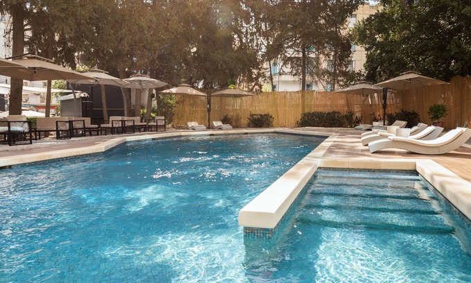Tunis Hotel | Relax at Golden Tulip El Mechtel: Pool, Spa & Family Friendly