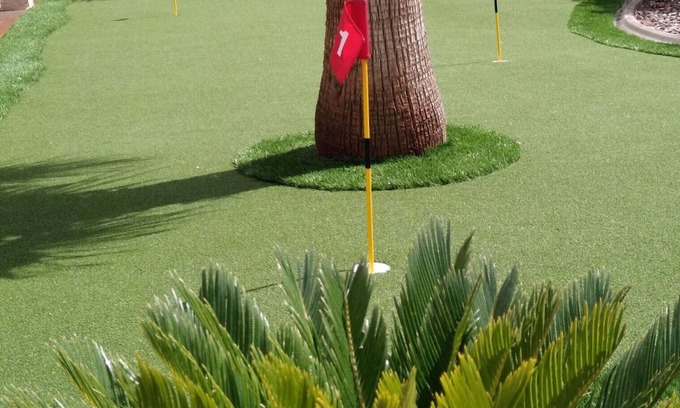 Paradise House | Top-Rated Hotel with Golf, Game Room & Family Amenities