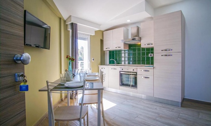 Agnone Bagni Apartment | Cozy Golf House Steps from the Beach with Ocean Views