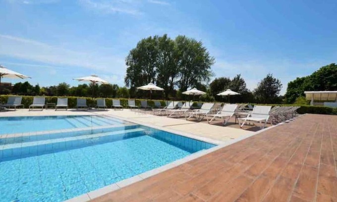 Lido di Jesolo Apartment | Golf Jesolo Village: Penthouse with Pool & Ocean Views