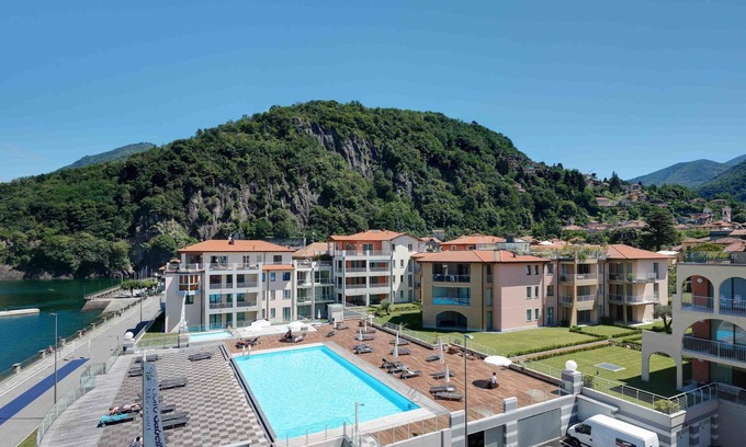 Maccagno Apartment | Golfo Gabella: Oceanfront Bliss with Spa and Pool Access