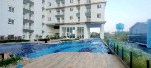 Sidoarjo Apartment | Convenient Studio Apartment at Suncity Residence by Travelio