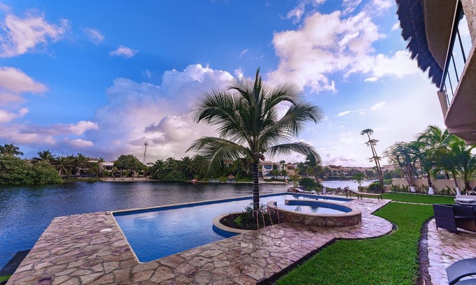 Puerto Aventuras Condo | Discover a 3 Bdrm Lagoon Condo with Pool & Ocean Views