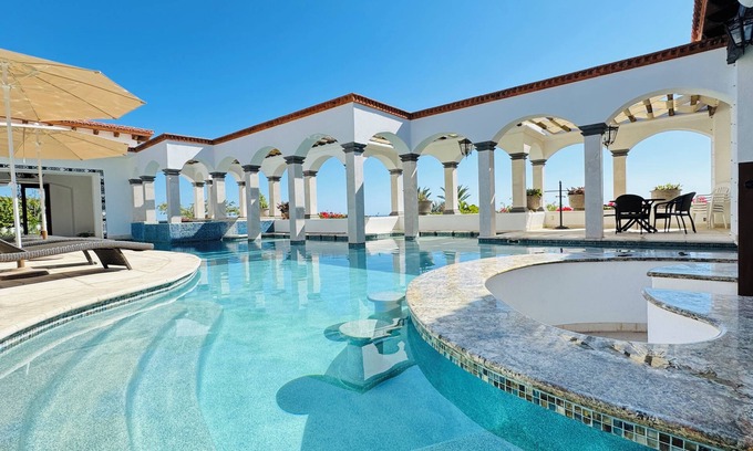 Buzzards House | Beachfront 7-Bedroom Retreat with Private Pool & Spa