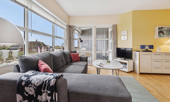 Rindby Strand Apartment | Cozy Retreat at Fanø Bath: Beachfront Vacation Apartment