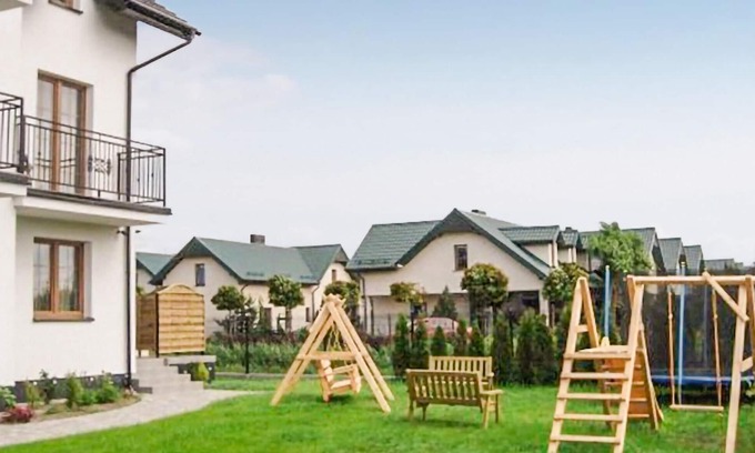 Karwia Apartment | Modern Vacation Apartment with Family-Friendly Garden