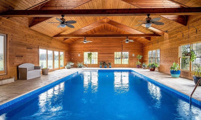Radnor House | Elegant Retreat with Indoor Heated Pool & Gourmet Kitchen